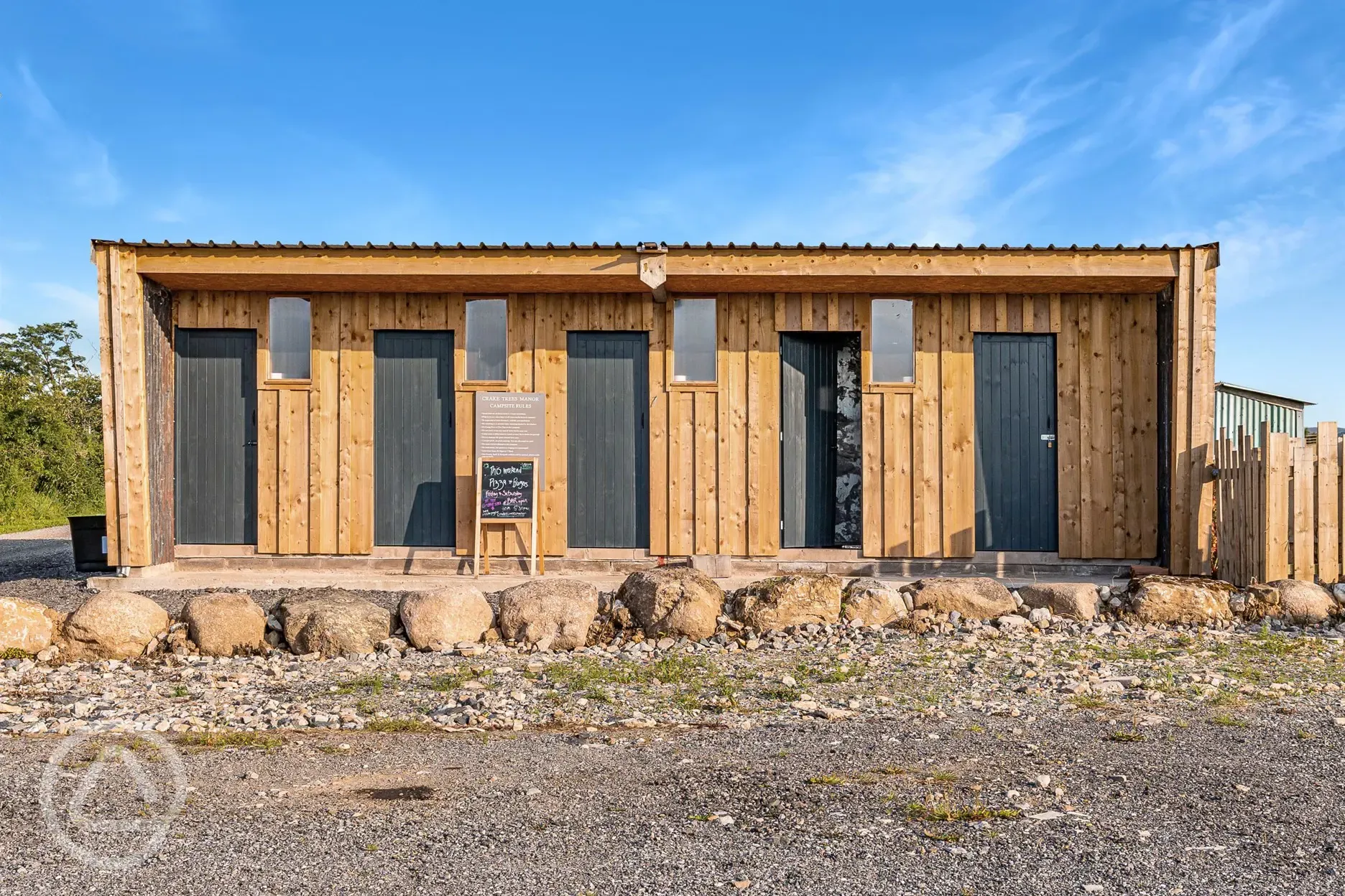 The accessible facility block with individual showers and underfloor heating