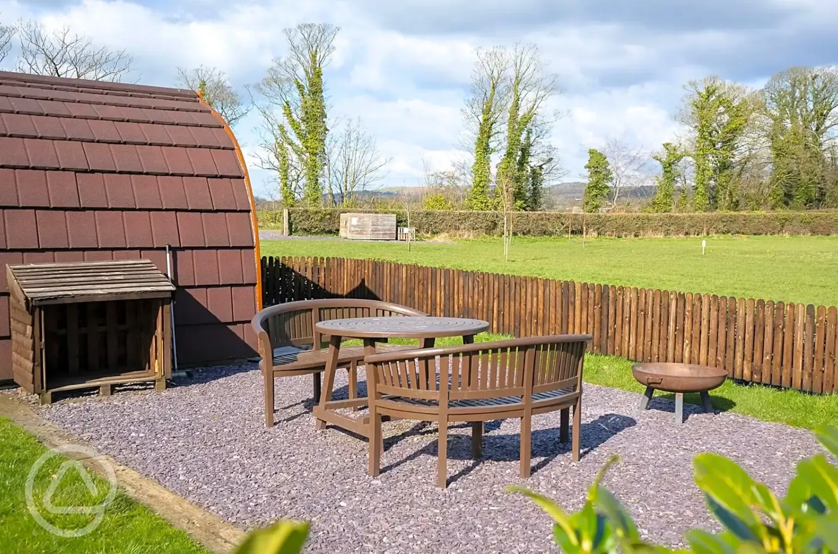 Bramble and Willow glamping pods - outdoor seating area and fire pit
