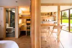 Blossom glamping pod - interior with bunk beds and ensuite bathroom