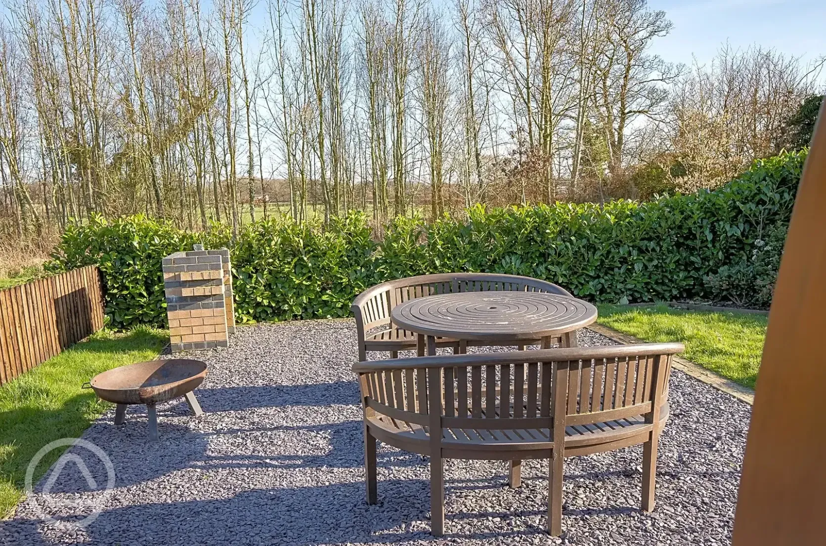 Bramble and Willow glamping pods - outdoor seating area and fire pit