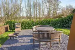 Bramble and Willow glamping pods - outdoor seating area and fire pit