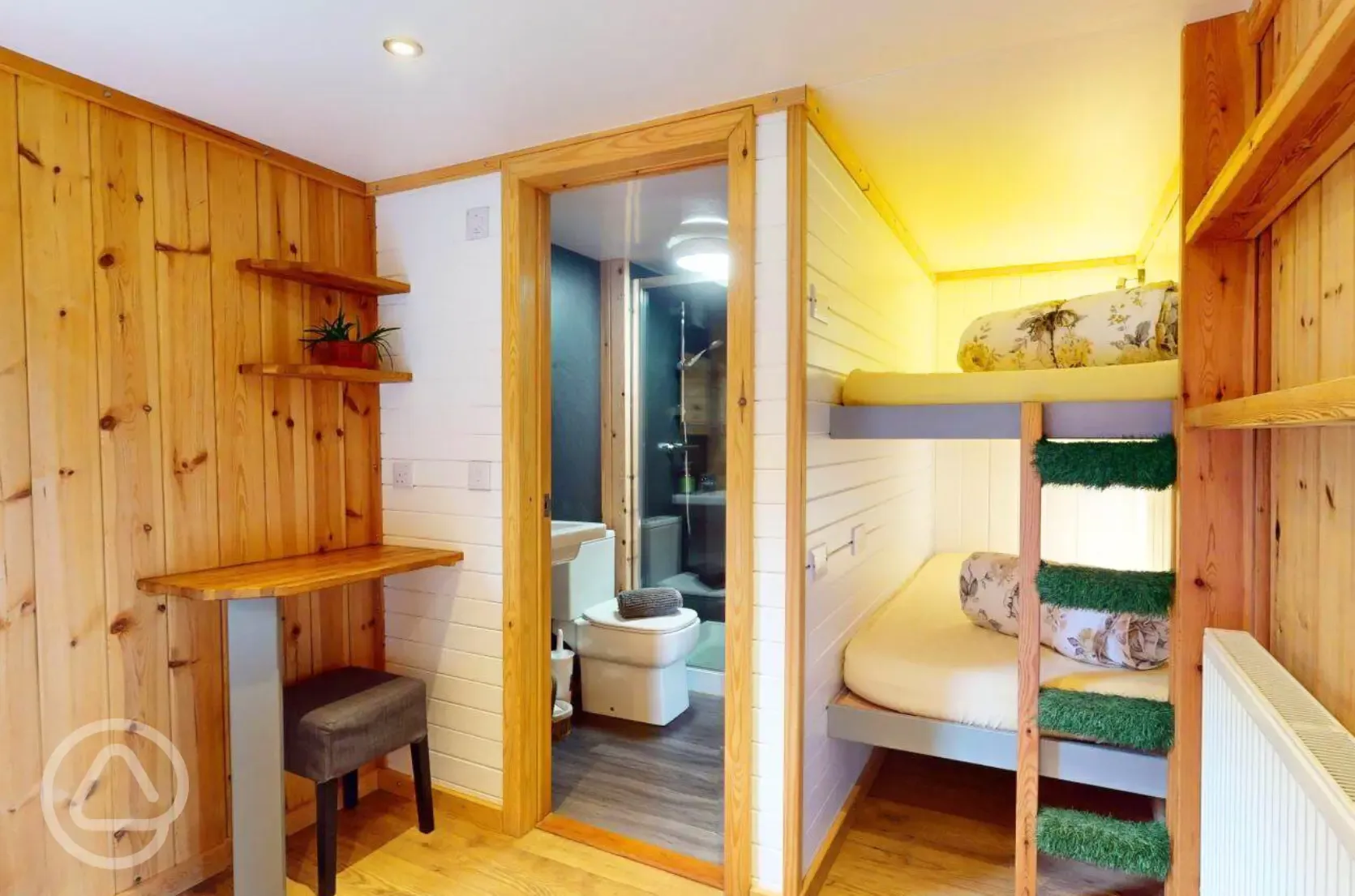 Blossom glamping pod - interior with bunk beds and ensuite bathroom