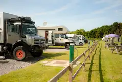 Fully serviced hardstanding pitches with water, electric and drainage Fully serviced hardstanding pitches with water, electric and drainage