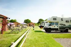 Fully serviced hardstanding pitches with water, electric and drainage Fully serviced hardstanding pitches with water, electric and drainage