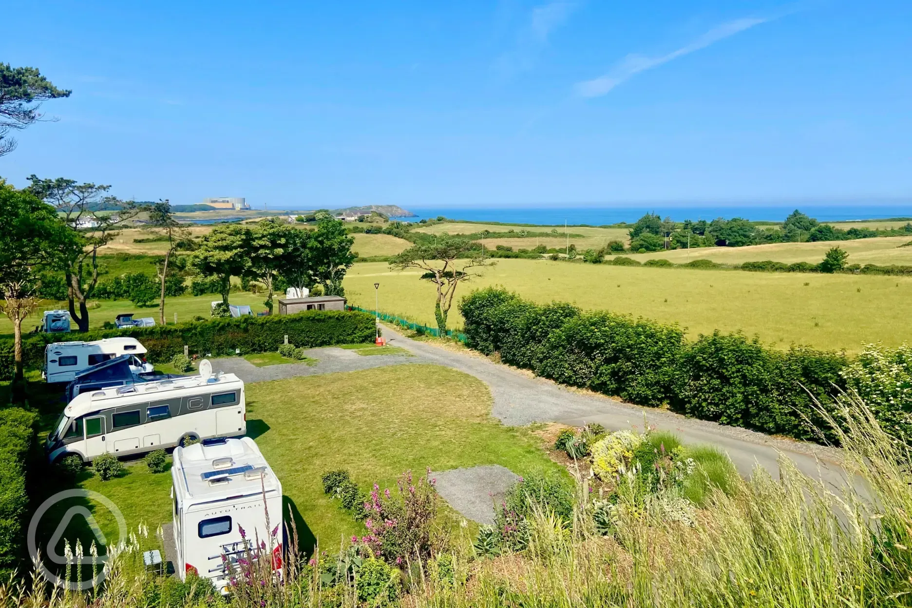 Aerial of Gadlys Touring Park with views towards Traeth Mawr Big Beach