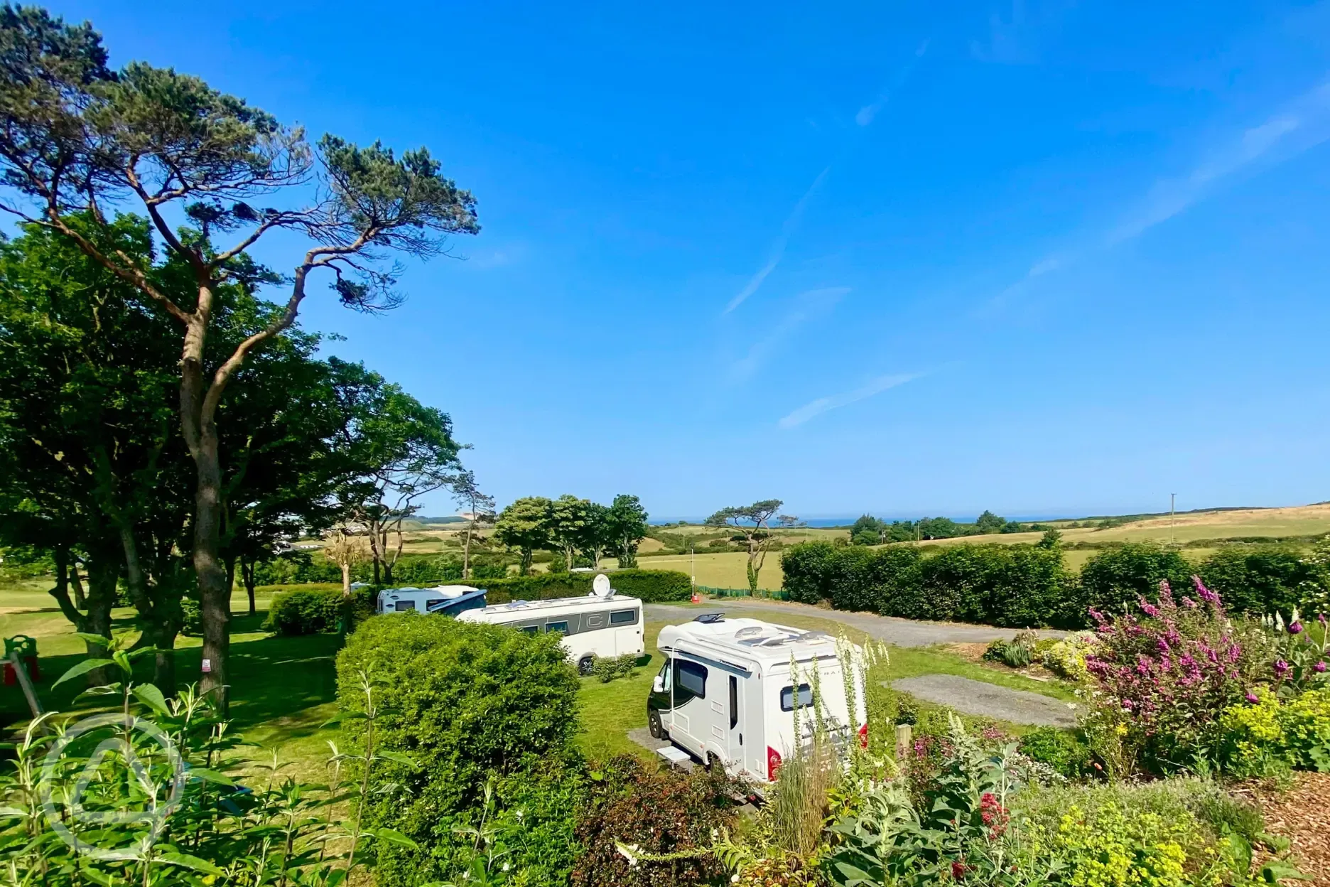 Fully serviced hardstanding pitches with 10 amp electric, water and grey waste