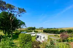 Fully serviced hardstanding pitches with 10 amp electric, water and grey waste