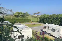 Fully serviced hardstanding pitches with 10 amp electric, water and grey waste