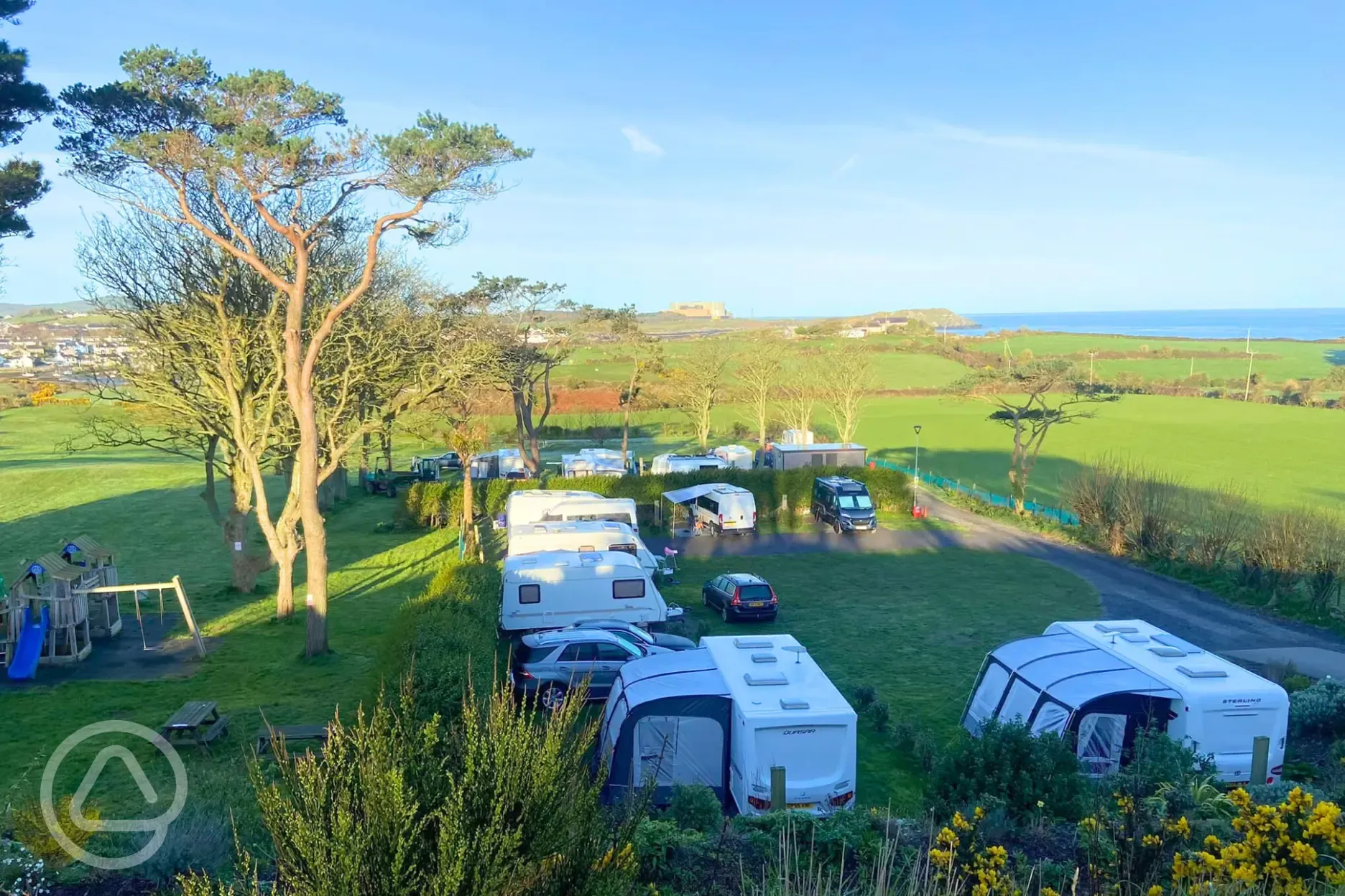 Overview of Gadlys Touring Park with views towards Traeth Mawr Big Beach