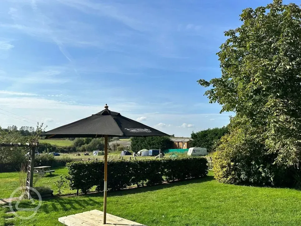 Pub garden with view of pitches