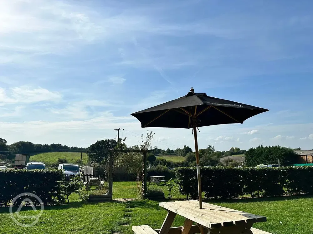The Gate Hangs High pub garden with view of pitches