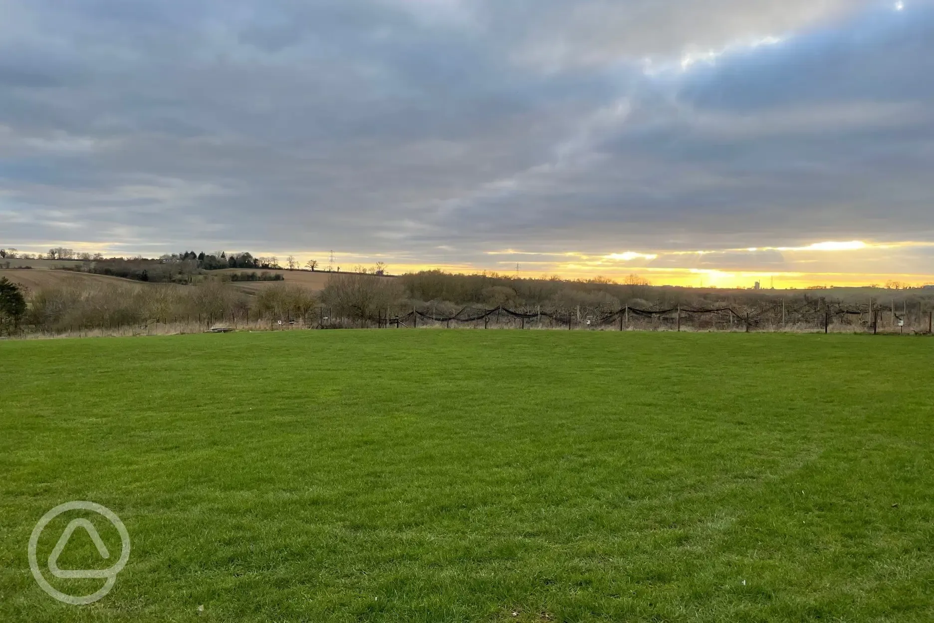 Grass pitches at sunset