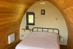 Camping pod with a double bed and sofa bed Camping pod with a double bed and sofa bed