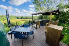 Glamping domes outdoor decking, seating area and hot tub Glamping domes outdoor decking, seating area and hot tub