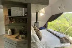 Small kitchenette beside the king sized bed in the glamping domes Small kitchenette beside the king sized bed in the glamping domes