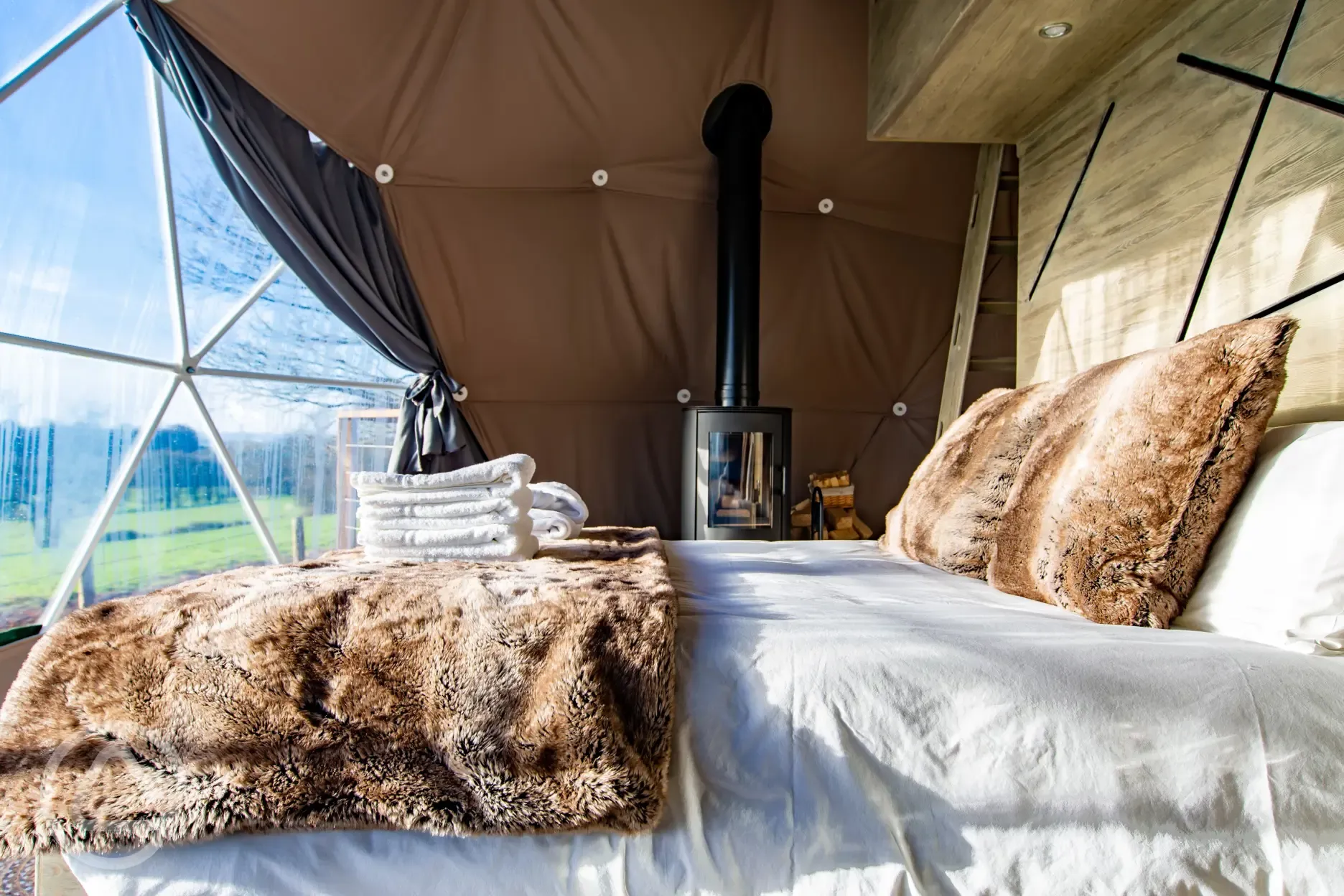 Glamping dome king sized bed