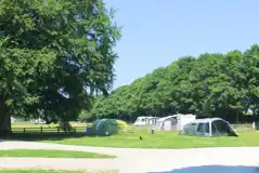 Grass 5m x 7.5m pitches with 10 amp electric hook ups