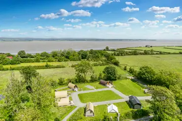 Aerial of the glamping pods and the Solway Coast