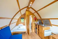 Glamping pod with optional four person hot tub interior