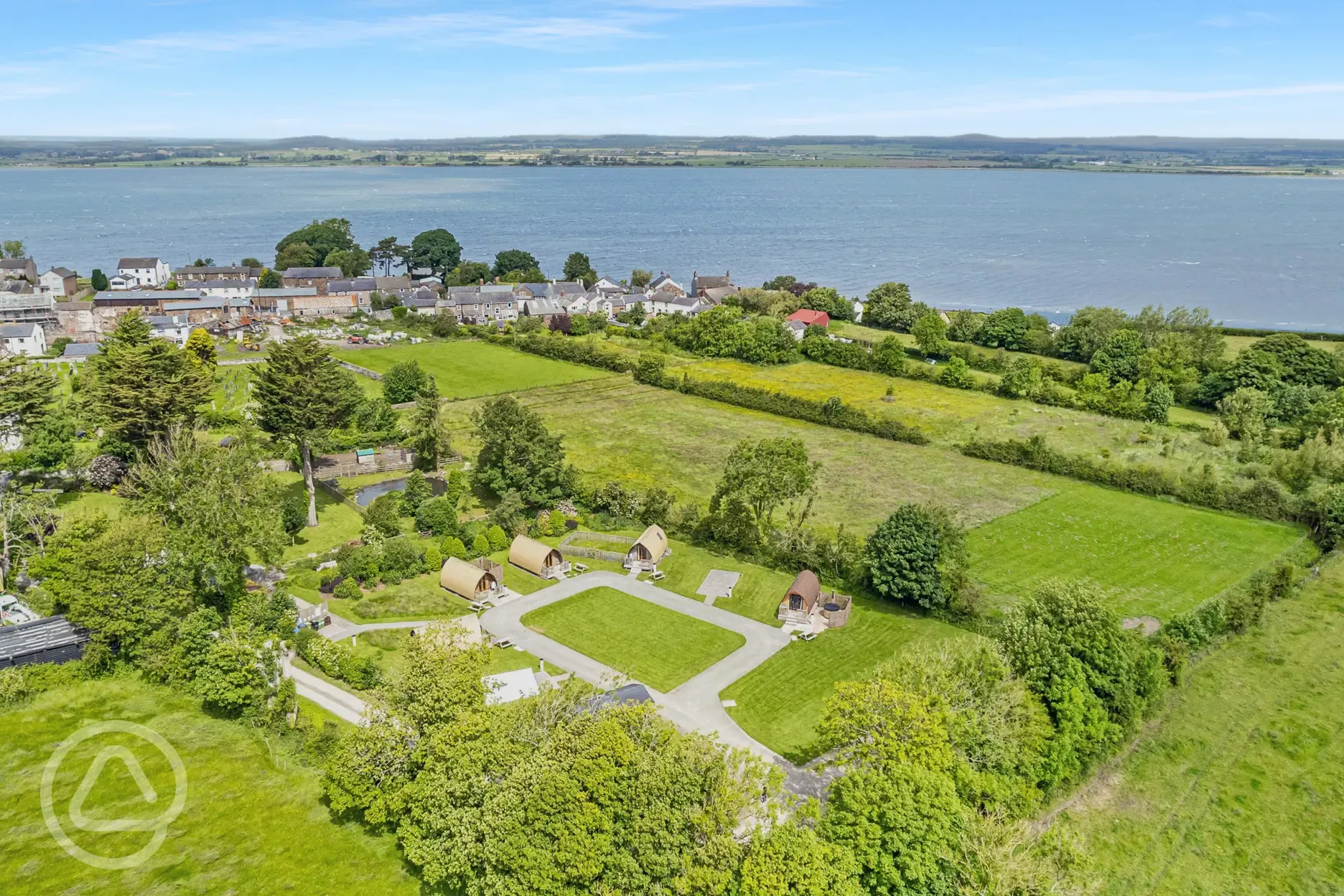 Aerial of the glamping pods and the Solway Coast