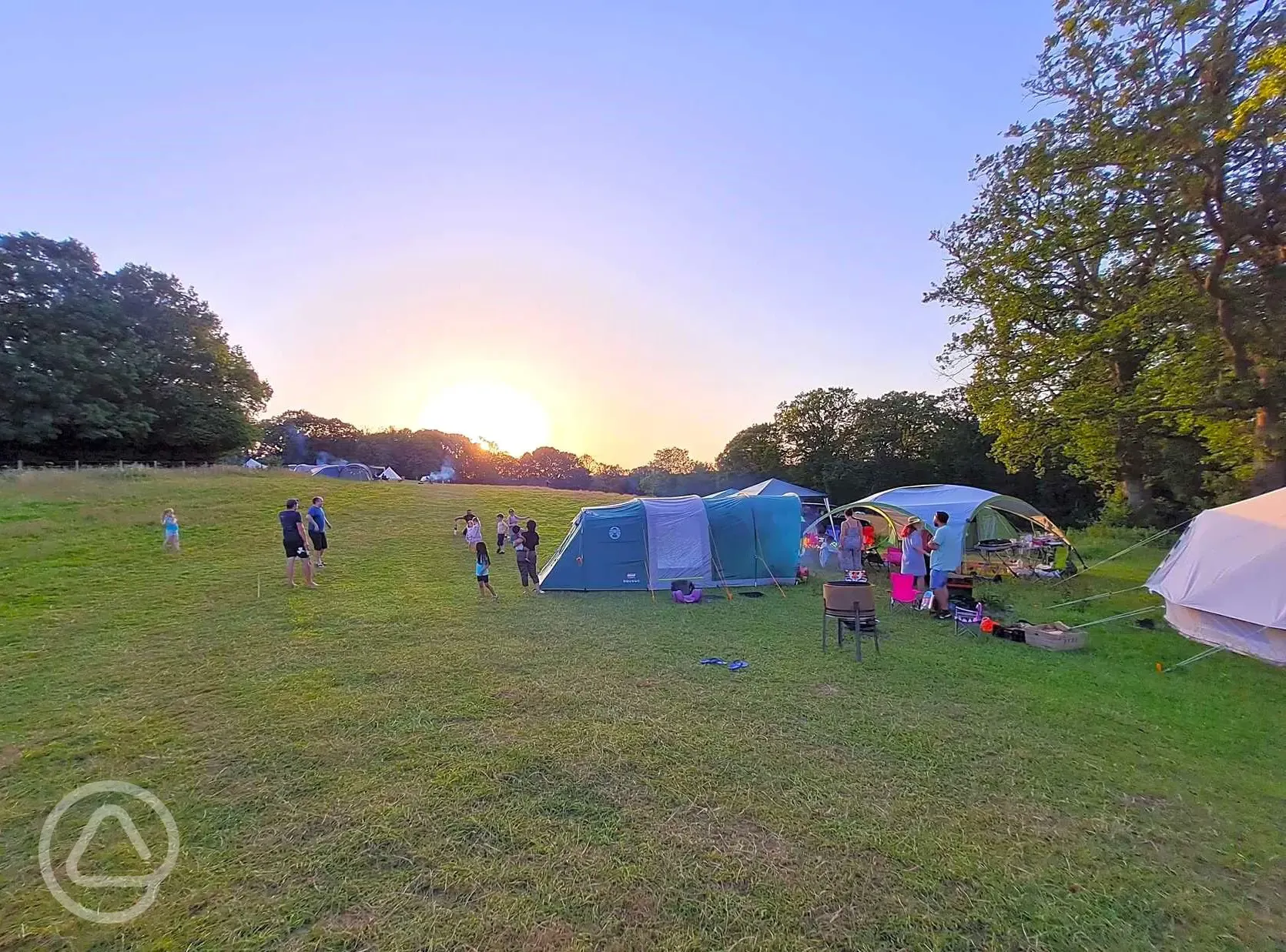 Sunset over the non electric grass pitches