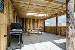 Safari tents shared covered BBQ area