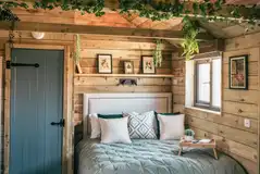 Potting Barn with a king size bed and bedding