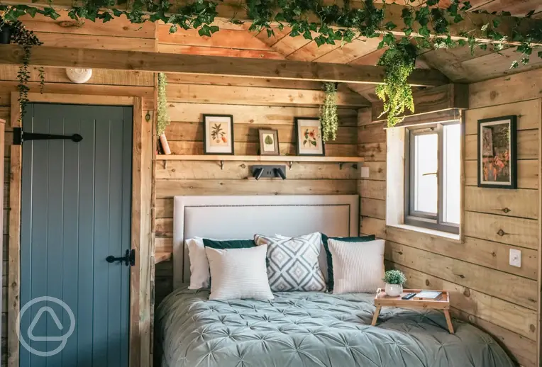 Potting Barn with a king size bed and bedding