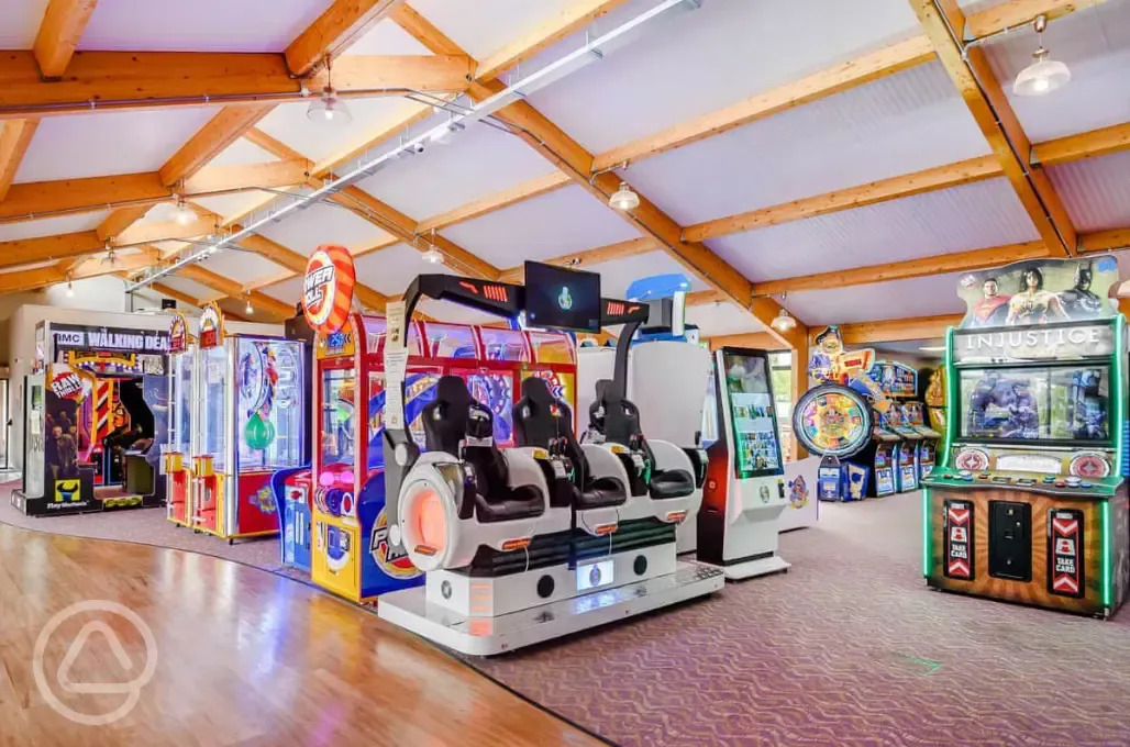 Arcade with air hockey, pool, 2p machines, and more
