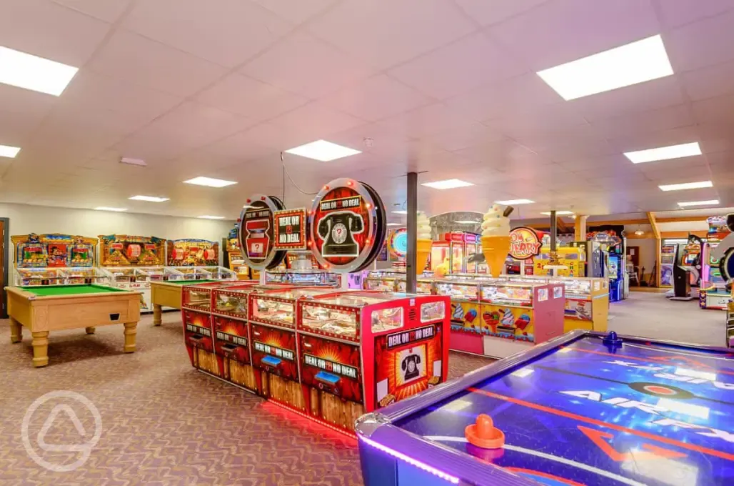 Arcade with air hockey, pool, 2p machines, and more