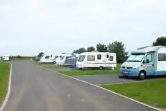Fully serviced gravel touring pitches Fully serviced gravel touring pitches