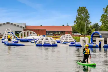 Inflatable obstacle course on Grange Leisure Park's lake