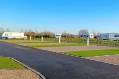 Electric grass and gravel hardstanding pitches with 16 amp hook up Electric grass and gravel hardstanding pitches with 16 amp hook up
