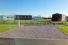 Fully serviced hardstanding pitches measuring 6m x 10m with 16 amp hook up Fully serviced hardstanding pitches measuring 6m x 10m with 16 amp hook up