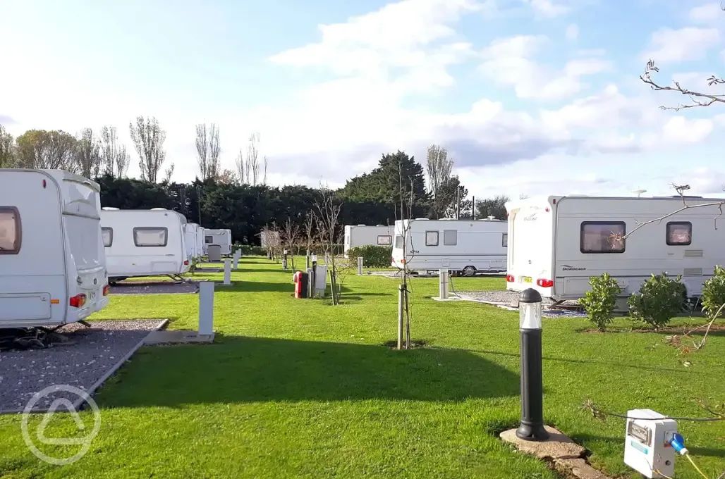 Electric grass and gravel hardstanding pitches