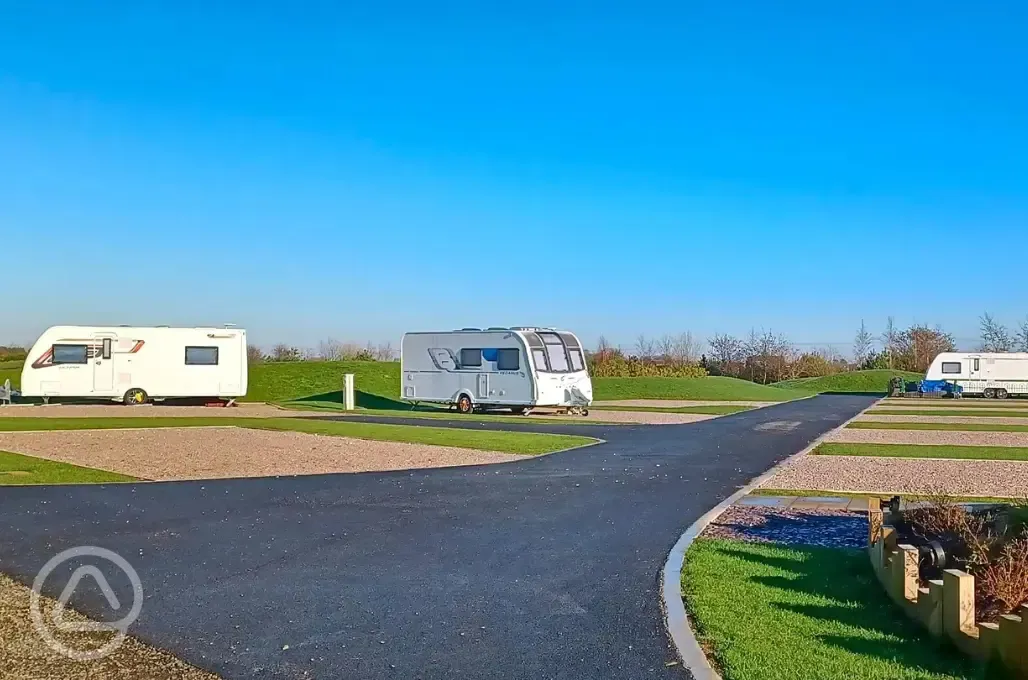 Electric grass and gravel hardstanding pitches