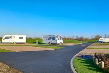 Electric grass and gravel hardstanding pitches