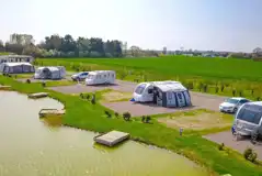 Fully serviced hardstanding pitches (adults only, lake view)