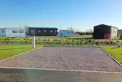 Fully serviced hardstanding pitches measuring 6m x 10m with 16amp hook up Fully serviced hardstanding pitches measuring 6m x 10m with 16amp hook up
