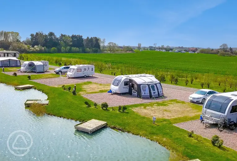 Fully serviced hardstanding pitches (adults only, lake view) at The Laurels