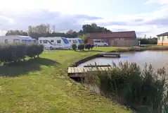Fully serviced hardstanding pitches (adults only, lake view) with 16amp hook up Fully serviced hardstanding pitches (adults only, lake view) with 16amp hook up
