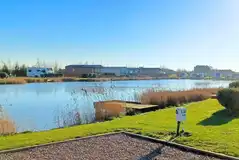 Fully serviced hardstanding pitches (adults only, lake view) measuring 8m x 8m Fully serviced hardstanding pitches (adults only, lake view) measuring 8m x 8m