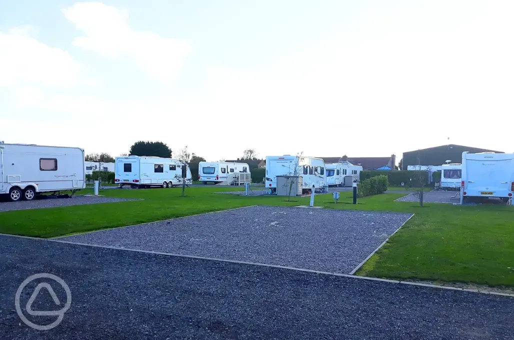 Electric grass and gravel hardstanding pitches
