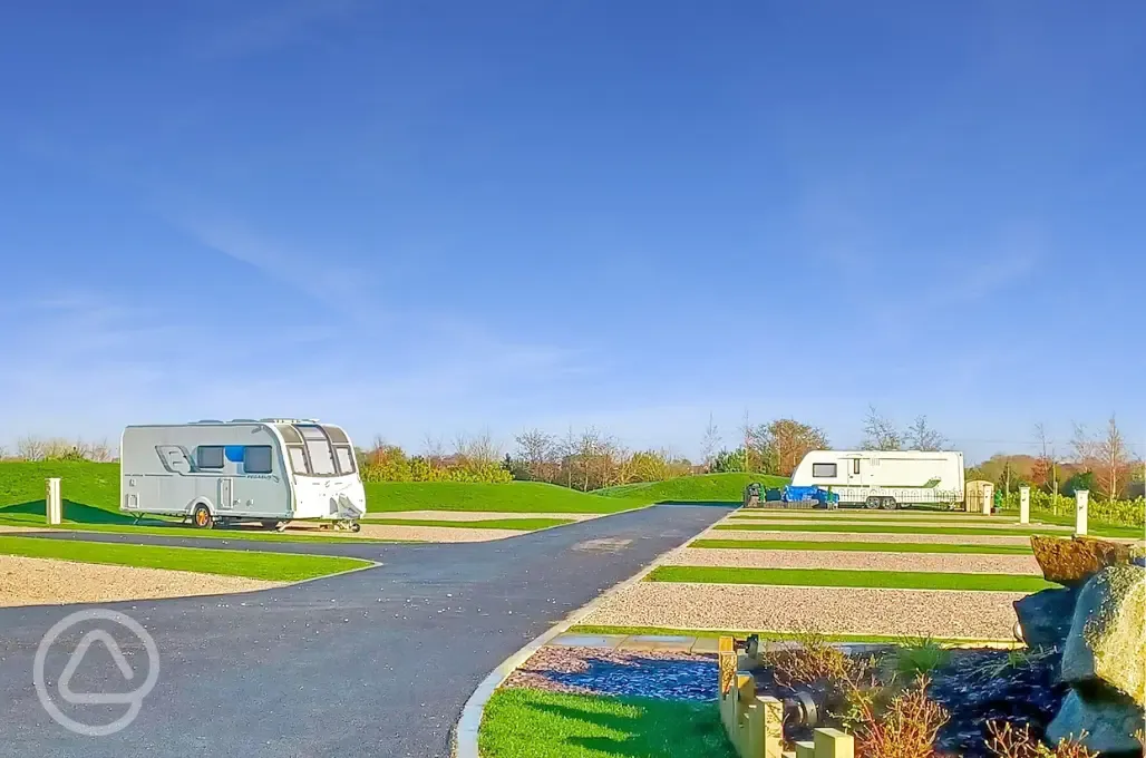 Electric grass and gravel hardstanding pitches
