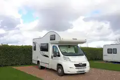 Electric grass and gravel hardstanding pitches