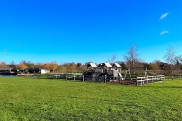 Outdoor play area at Old Buckenham Country Park views of the OB cafe/bar
