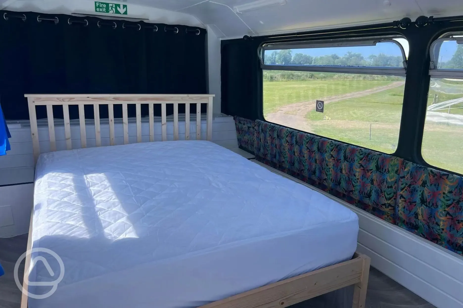 Glamping bus king sized bed