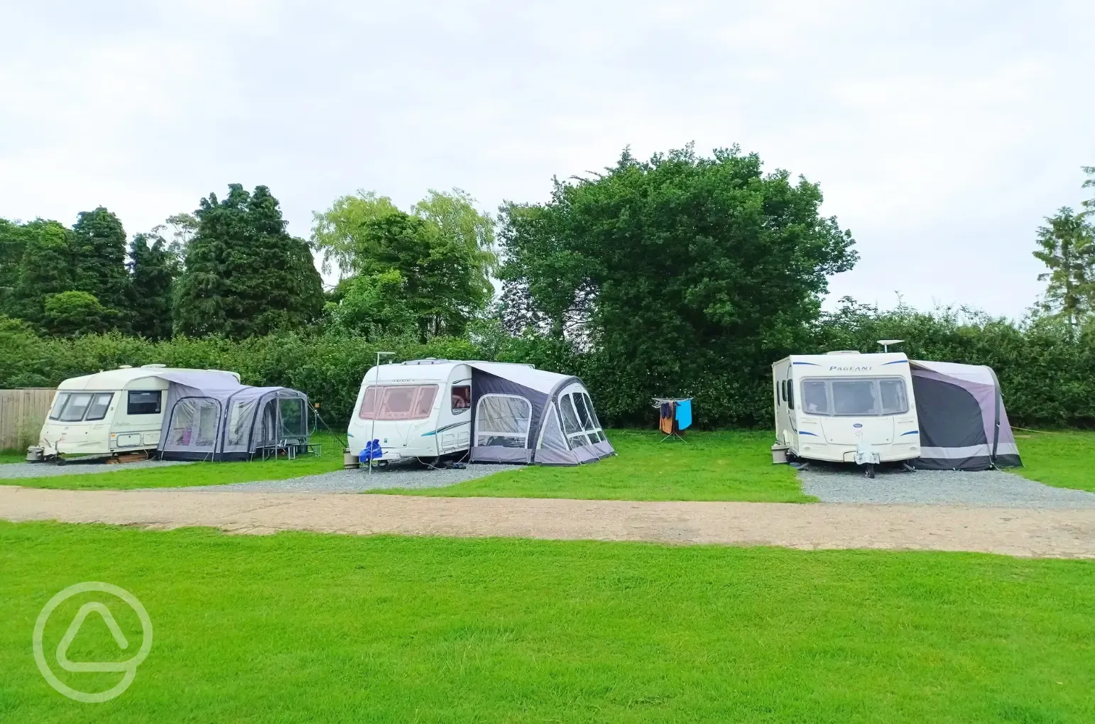 Electric hardstanding and grass touring pitches