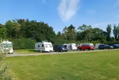 Electric hardstanding and grass touring pitches Electric hardstanding and grass touring pitches