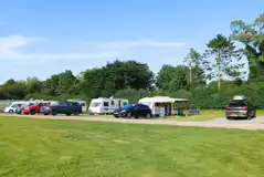 Electric hardstanding and grass touring pitches Electric hardstanding and grass touring pitches